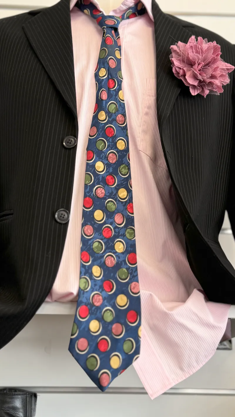 A gentleman's jacket, shirt and tie set at the Charity Corner