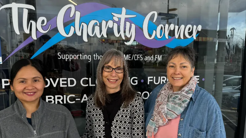 Staff and volunteers standing at the front of the Charity Corner